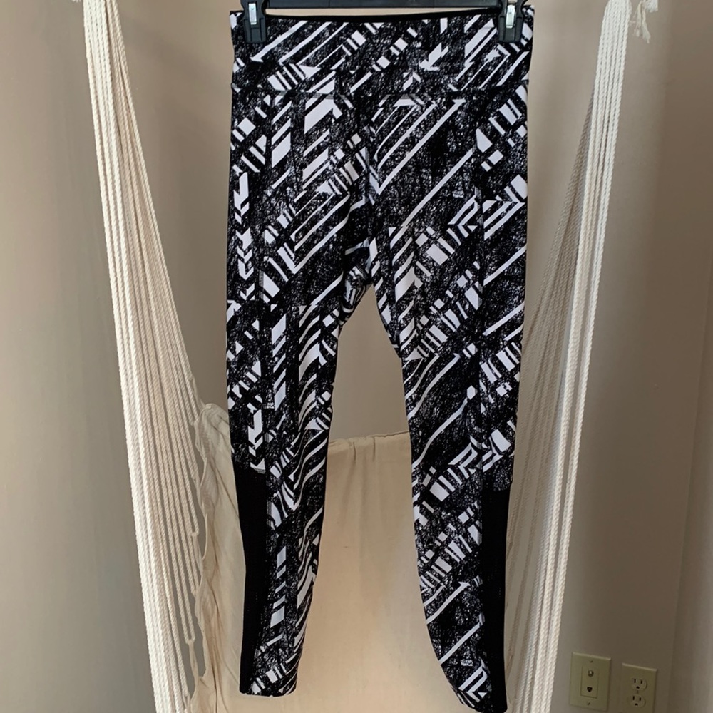 Spalding-Large Black & White workout leggings see thru panels.